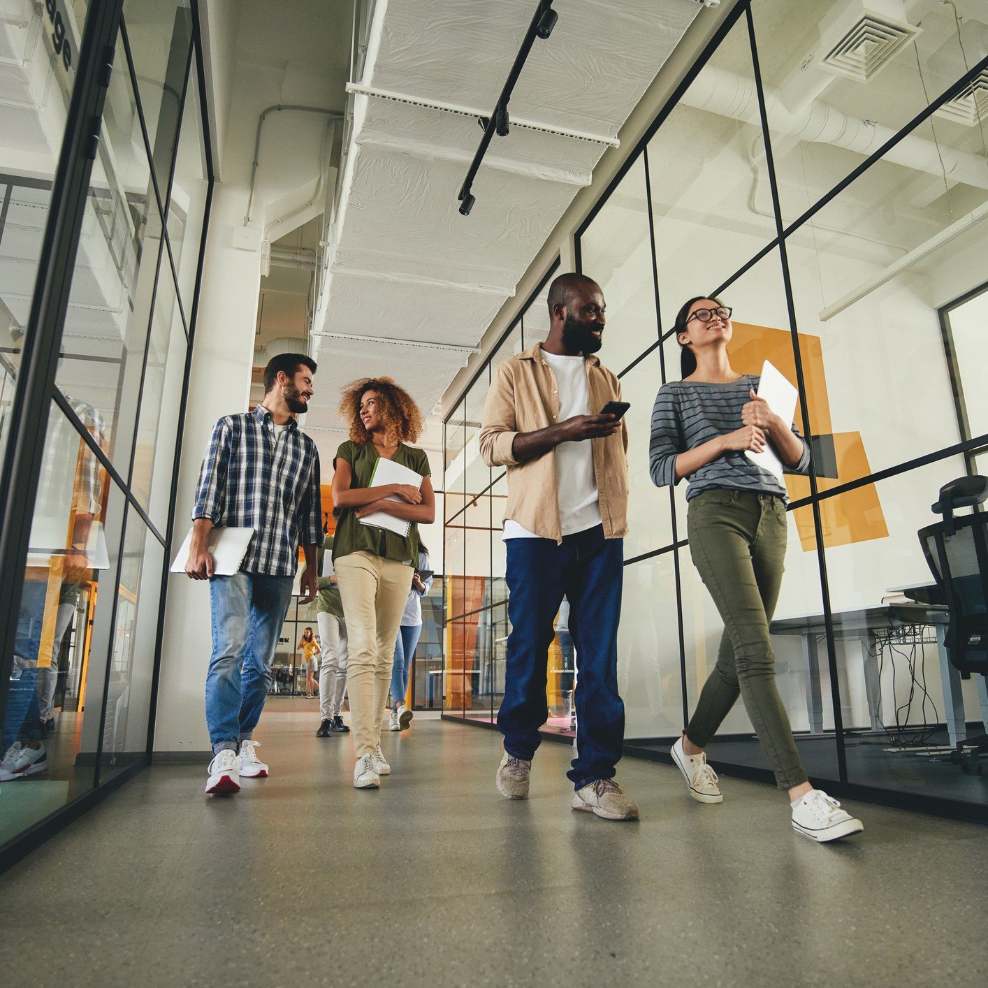 Photo of young professionals in office