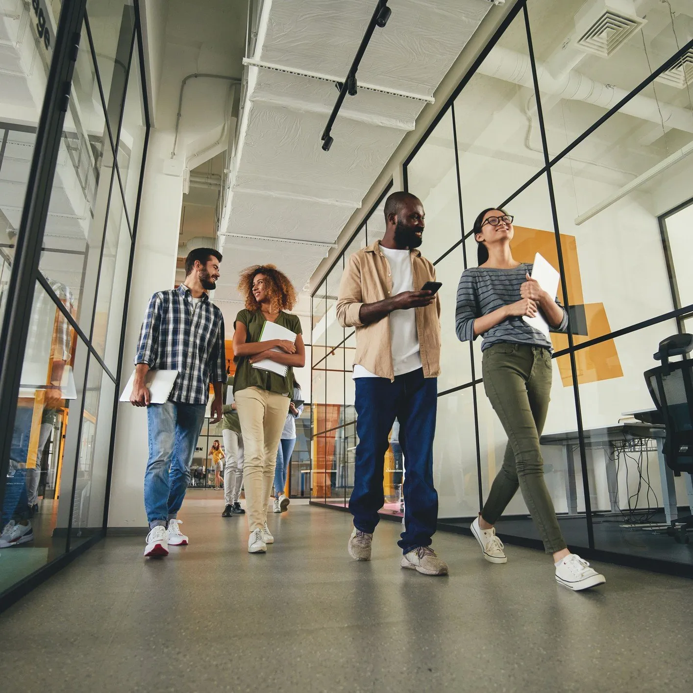 Photo of young professionals in office